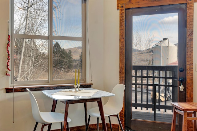 dining space with a mountain view