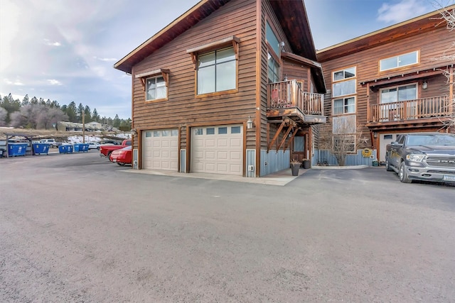 exterior space with a garage and driveway