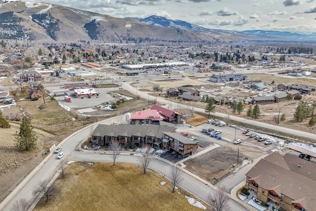 birds eye view of property featuring a mountain view