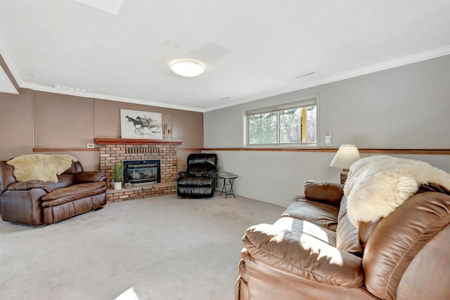 carpeted living room with visible vents, a brick fireplace, and crown molding