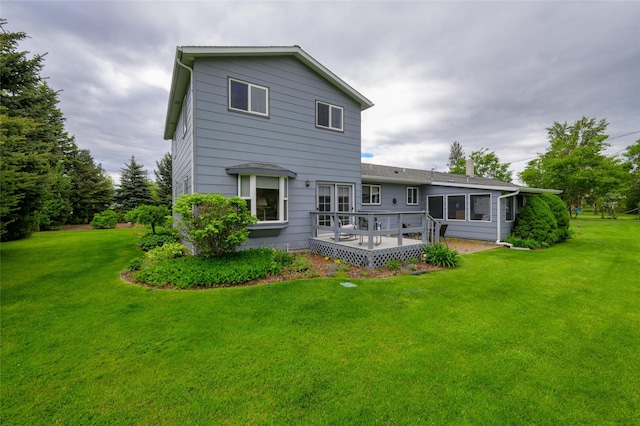 5400 Two Moons Rd, Florence, MT 59833 - back of property with a wooden deck and a yard
