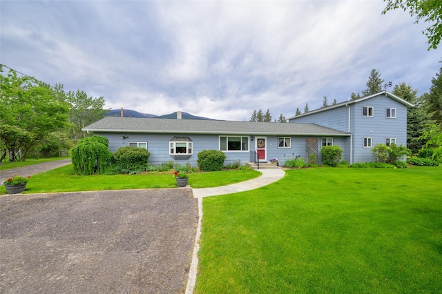 view of front of property with a front lawn