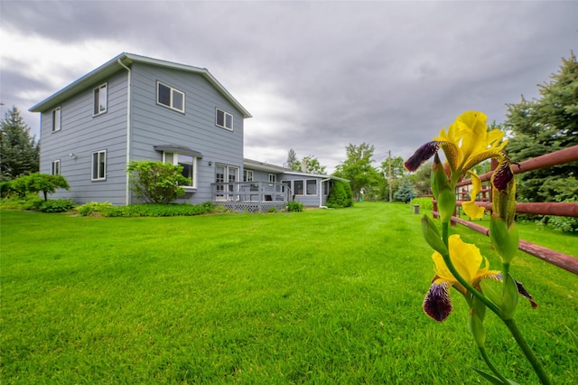 view of yard with a deck