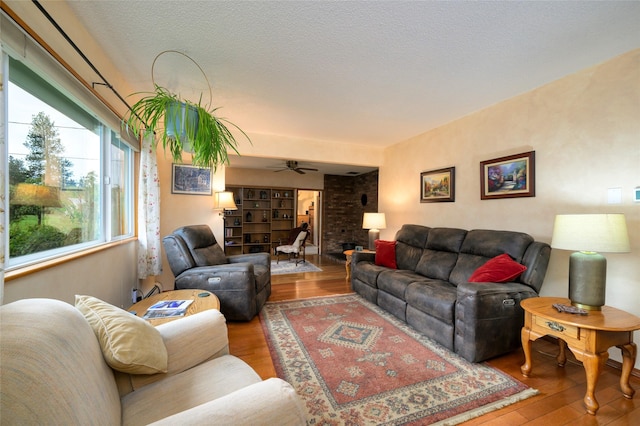 5400 Two Moons Rd, Florence, MT 59833 - living area featuring wood finished floors and a ceiling fan