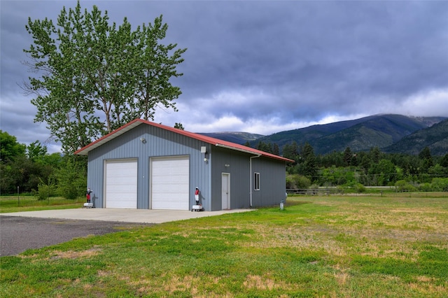 detached garage with a mountain view