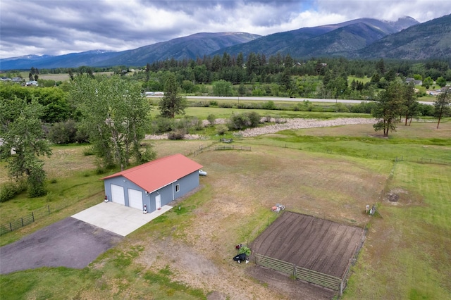 bird's eye view with a rural view and a mountain view