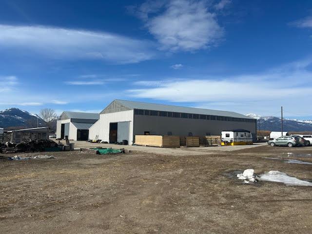 view of pole building with a mountain view