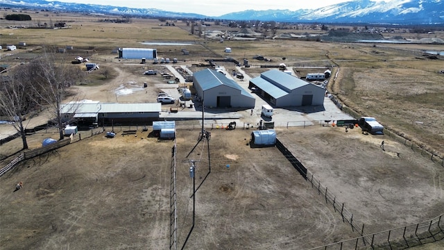 bird's eye view with a rural view and a mountain view