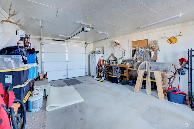 garage with fridge and a garage door opener