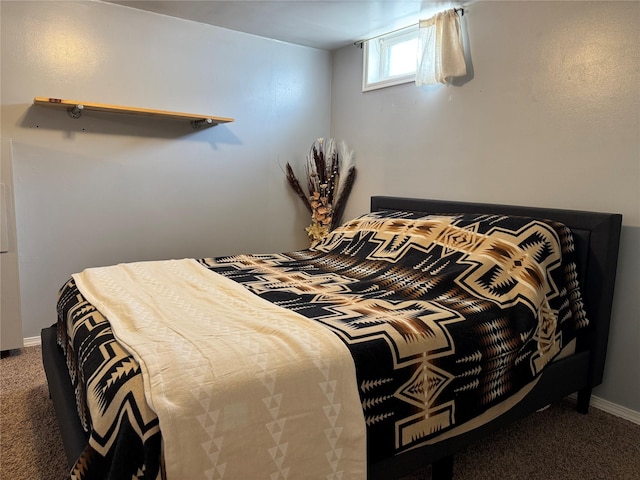 carpeted bedroom with baseboards