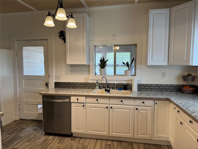 kitchen featuring white cabinetry, a sink, hanging light fixtures, dark wood-type flooring, and dishwasher