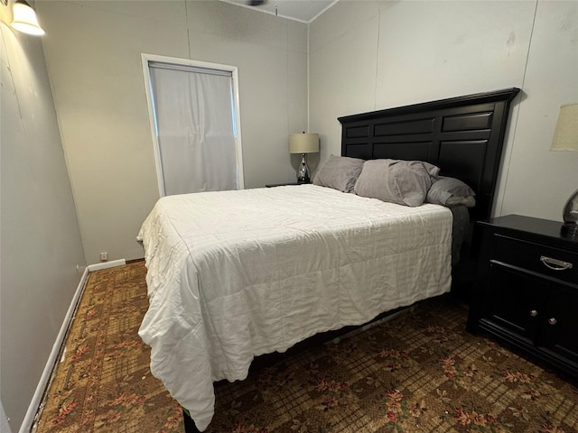 bedroom featuring baseboards