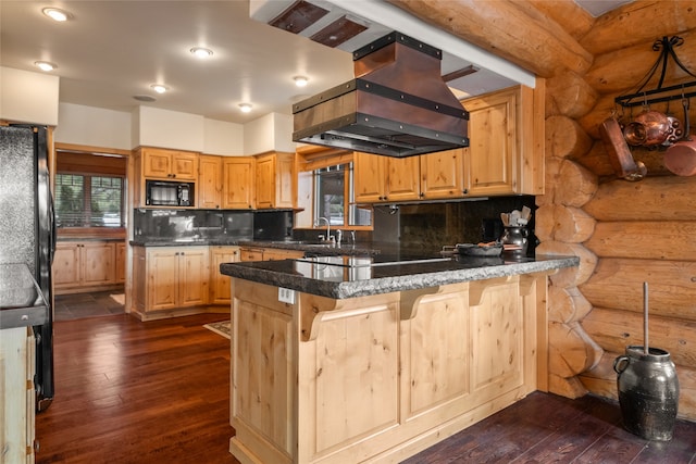 kitchen featuring black appliances, island exhaust hood, tasteful backsplash, and a peninsula