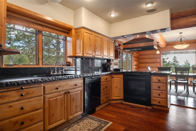 kitchen featuring log walls, dark wood finished floors, a sink, extractor fan, and black appliances