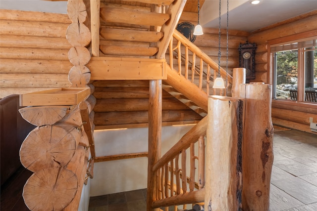 stairs with rustic walls