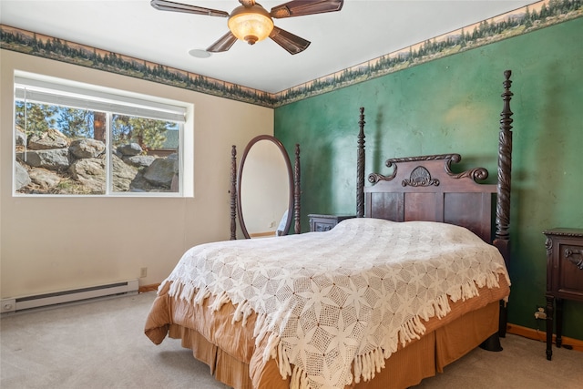 bedroom featuring carpet flooring, baseboards, a baseboard heating unit, and ceiling fan