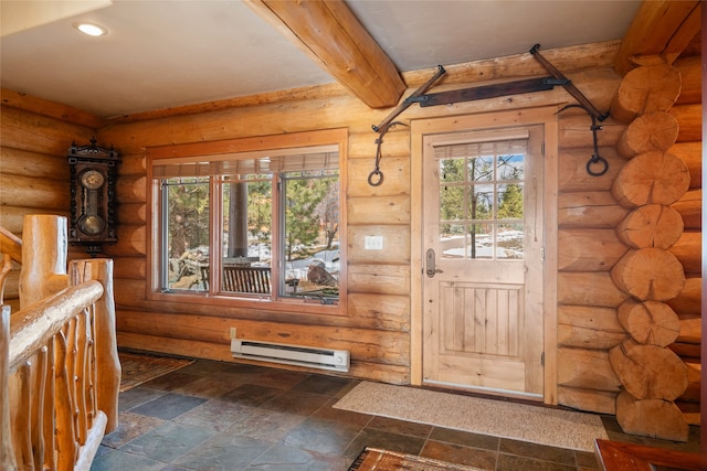 interior space with stone tile floors, log walls, and a baseboard heating unit