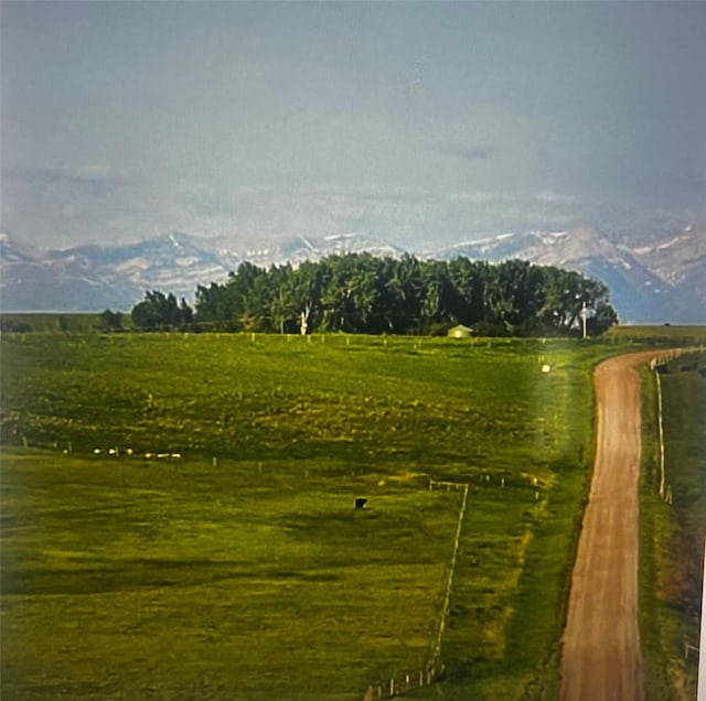 view of home's community featuring a mountain view and a rural view