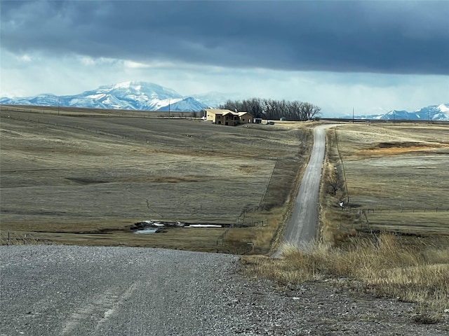 exterior space featuring a rural view and a mountain view