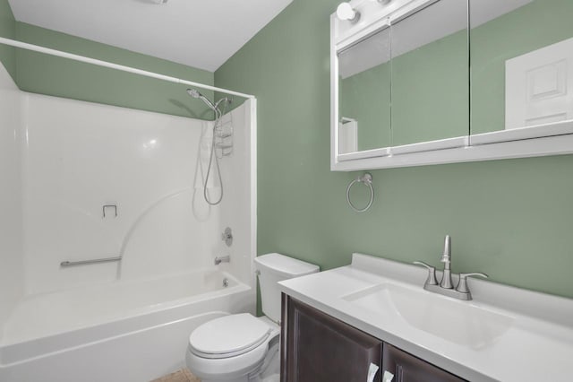 bathroom featuring shower / bathtub combination, toilet, and vanity