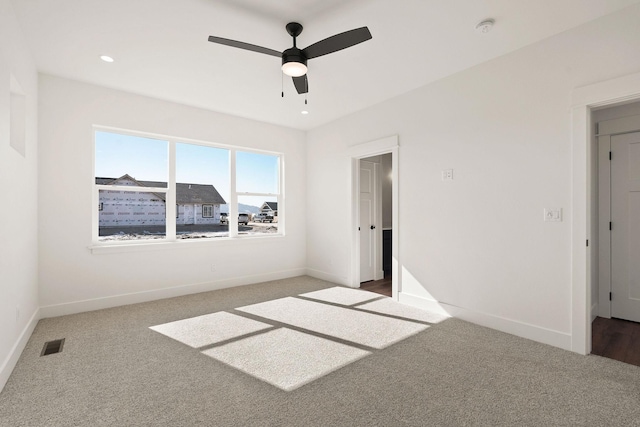 590 Stillwater Rd, Kalispell, MT 59901 - unfurnished bedroom featuring carpet floors, a ceiling fan, and recessed lighting