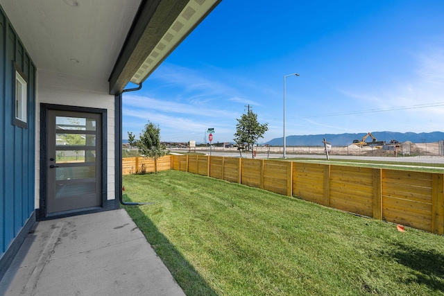 590 Stillwater Rd, Kalispell, MT 59901 - fenced backyard featuring a mountain view