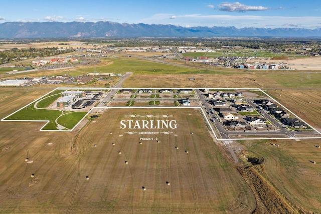 590 Stillwater Rd, Kalispell, MT 59901 - aerial overview of property's location featuring a mountainous background