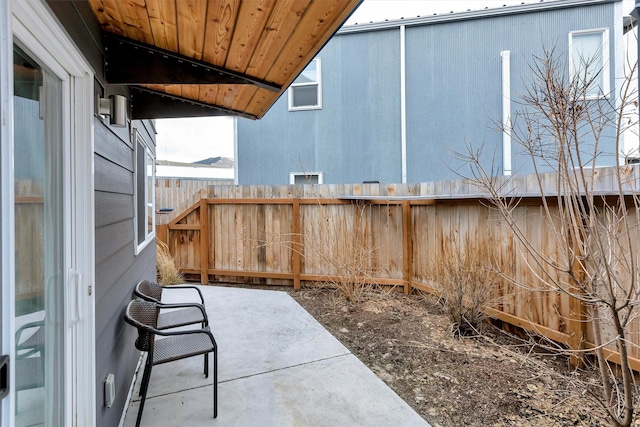 view of patio with fence