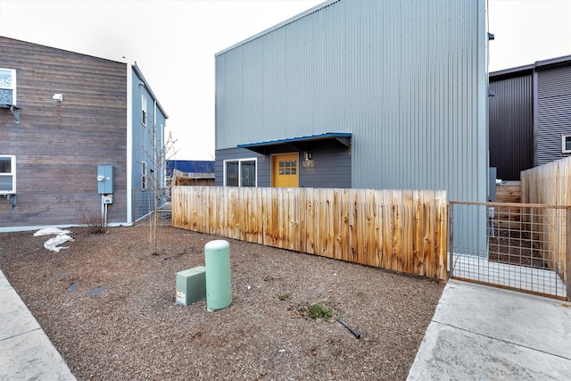 view of property exterior with fence