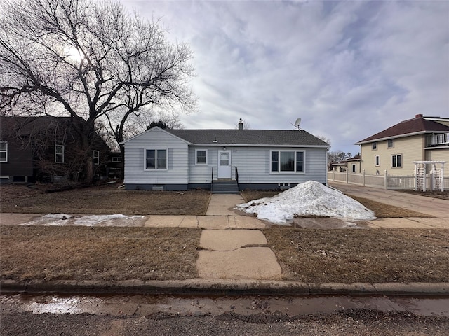 view of front of home with fence