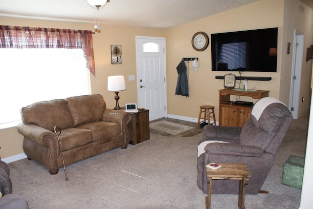 living area with carpet flooring and baseboards