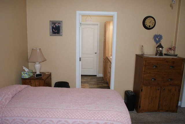 bedroom featuring connected bathroom