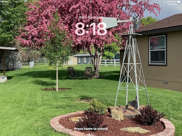 view of yard featuring fence