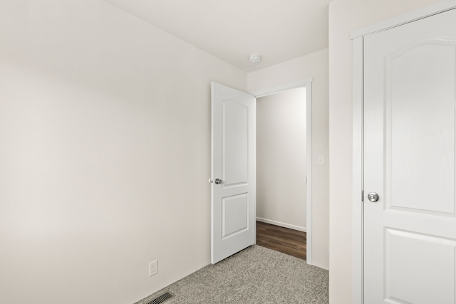 unfurnished bedroom with carpet