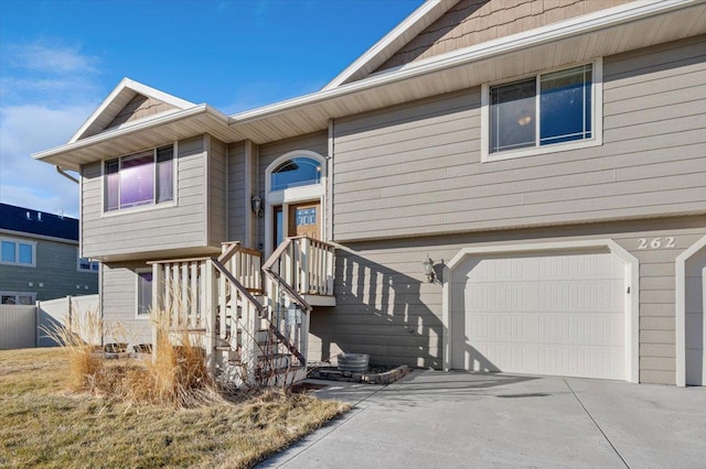 view of front of house with an attached garage and driveway