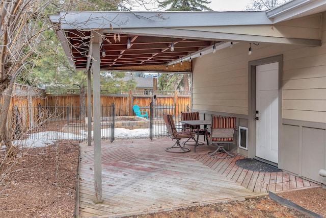 view of patio / terrace with fence and a wooden deck