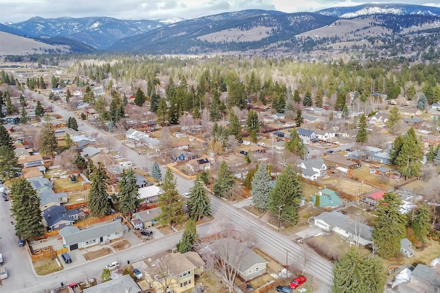 birds eye view of property with a mountain view and a residential view