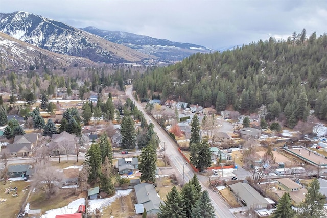 birds eye view of property with a mountain view and a residential view