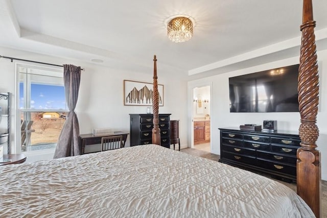 bedroom with carpet and ensuite bathroom