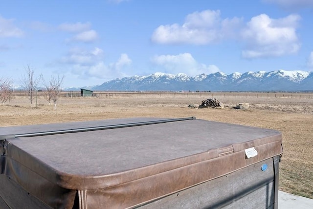 view of mountain feature featuring a rural view