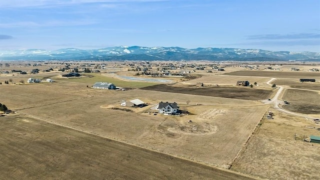 bird's eye view with a rural view and a mountain view