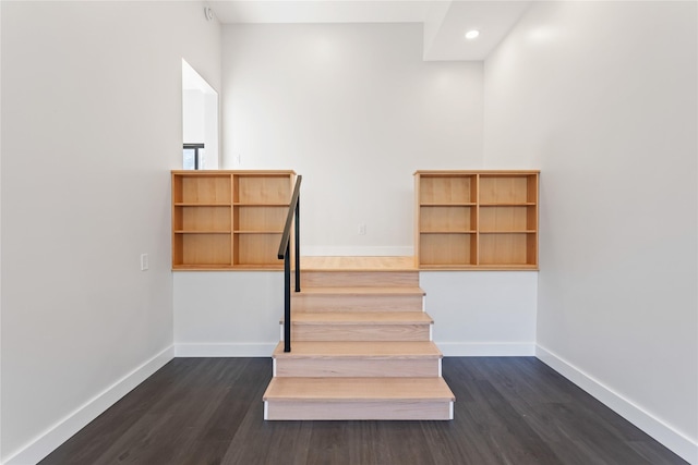 stairs featuring recessed lighting, baseboards, and wood finished floors