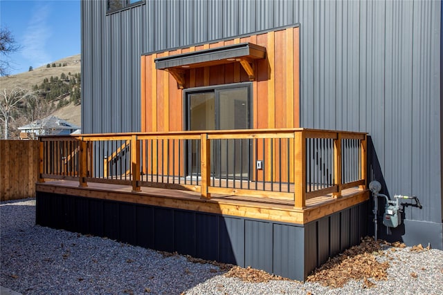 wooden deck with a mountain view