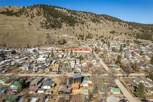 birds eye view of property with a mountain view and a residential view