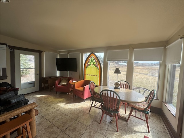 dining area with plenty of natural light