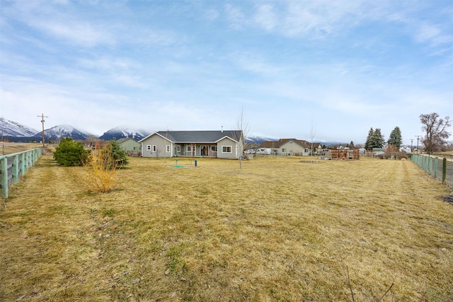 view of yard with fence