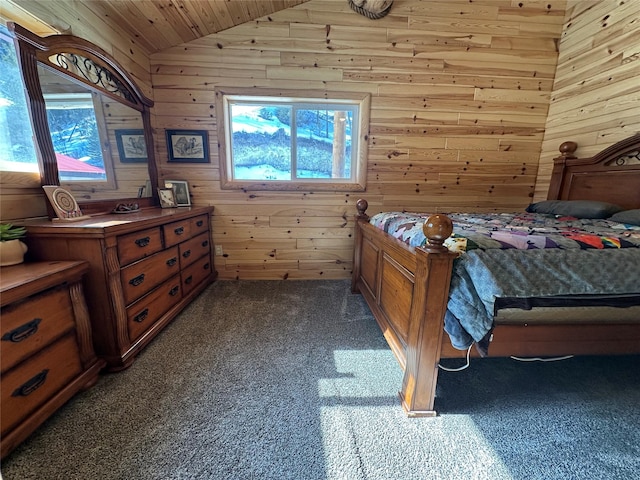 carpeted bedroom featuring lofted ceiling and wood walls