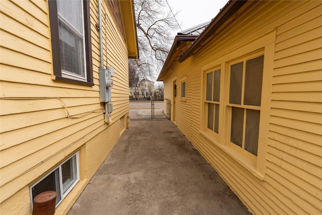 view of property exterior featuring a gate