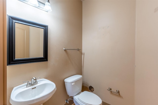 119 Oak St, Whitefish, MT 59937 - half bathroom with a sink and toilet