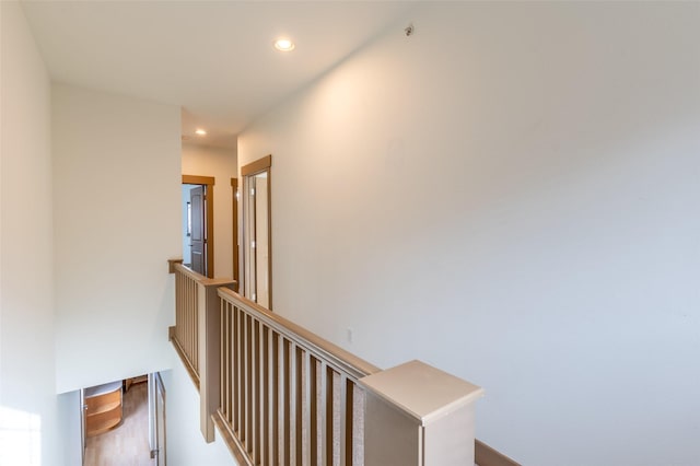 119 Oak St, Whitefish, MT 59937 - corridor with an upstairs landing, recessed lighting, and wood finished floors
